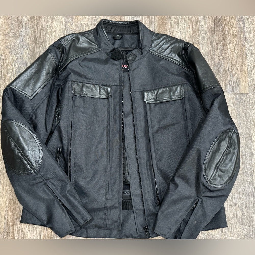 Revolution gear women’s XL riding jacket. Black Leather and canvas